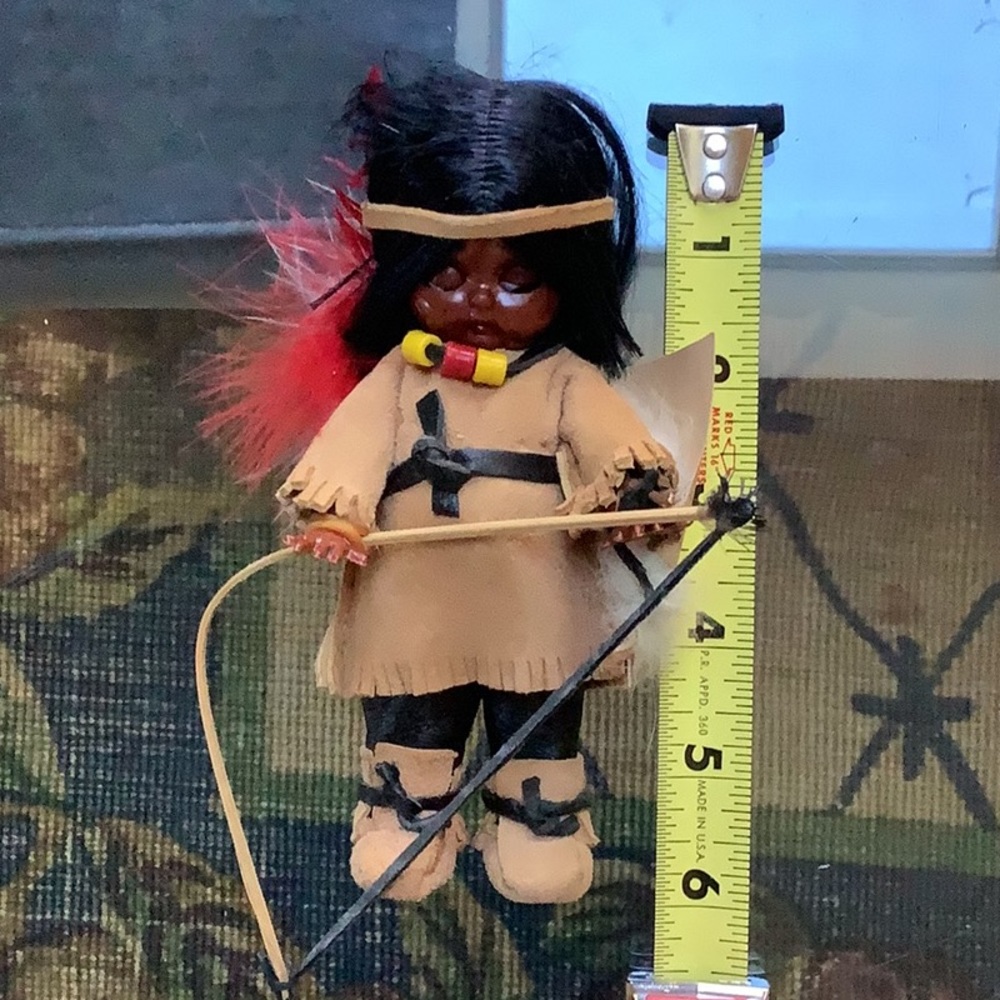 Vintage 1980 Carlson doll. Apache brave with bow.  Eyes open and close. With tag